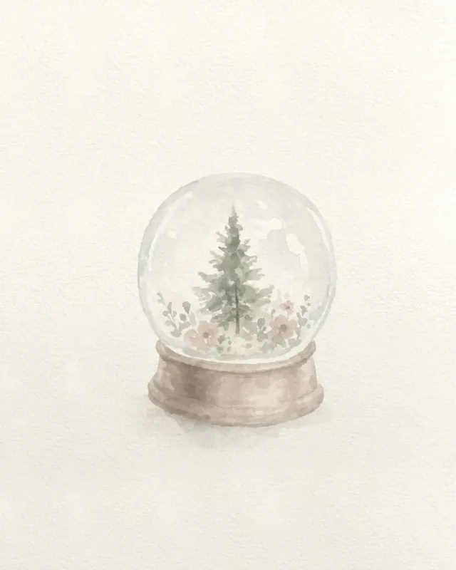 A snow globe with a tree inside